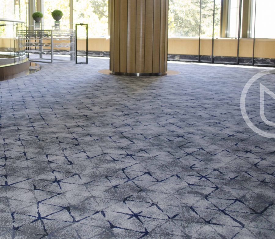 Axminster woven cut pile carpet of 80% wool 20% nylon.