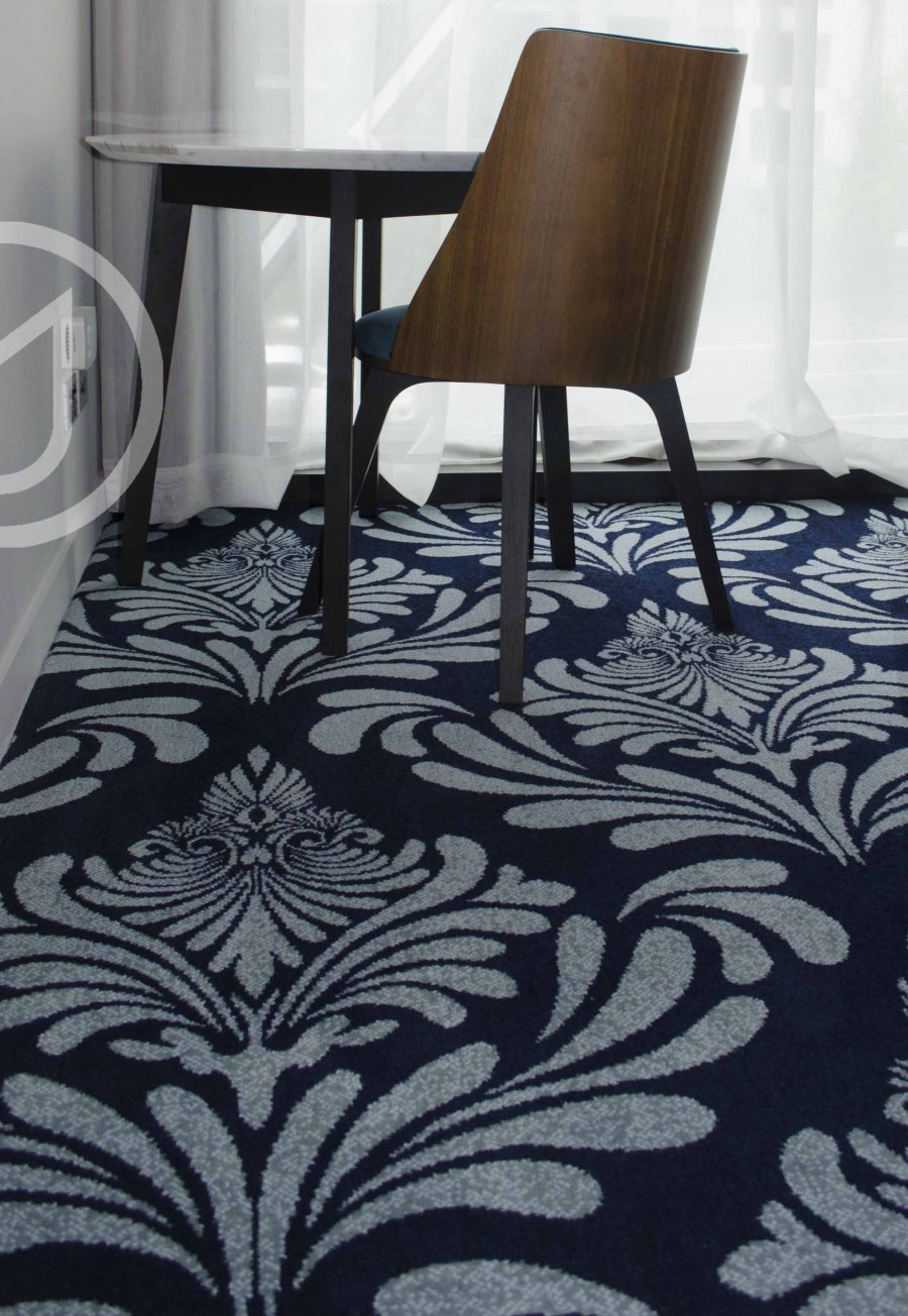 Axminster woven cut pile carpet of 80% wool 20% nylon.